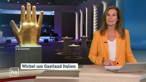 Moderatorin vor Bild mit Topthema