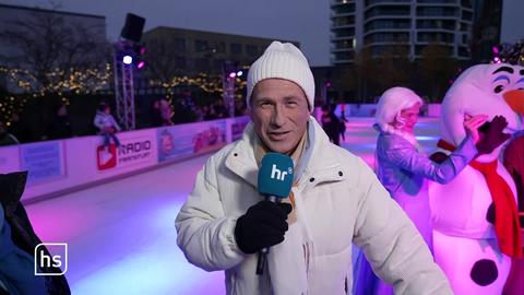 Reporter auf der Eisbahn