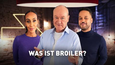 Rateteam: Bodo Bach, Hadnet Tesfai und Cossu schauen verschmitzt in die Kamera. Text: Was ist ein Broiler?