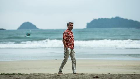 Ein Mann am Strand 